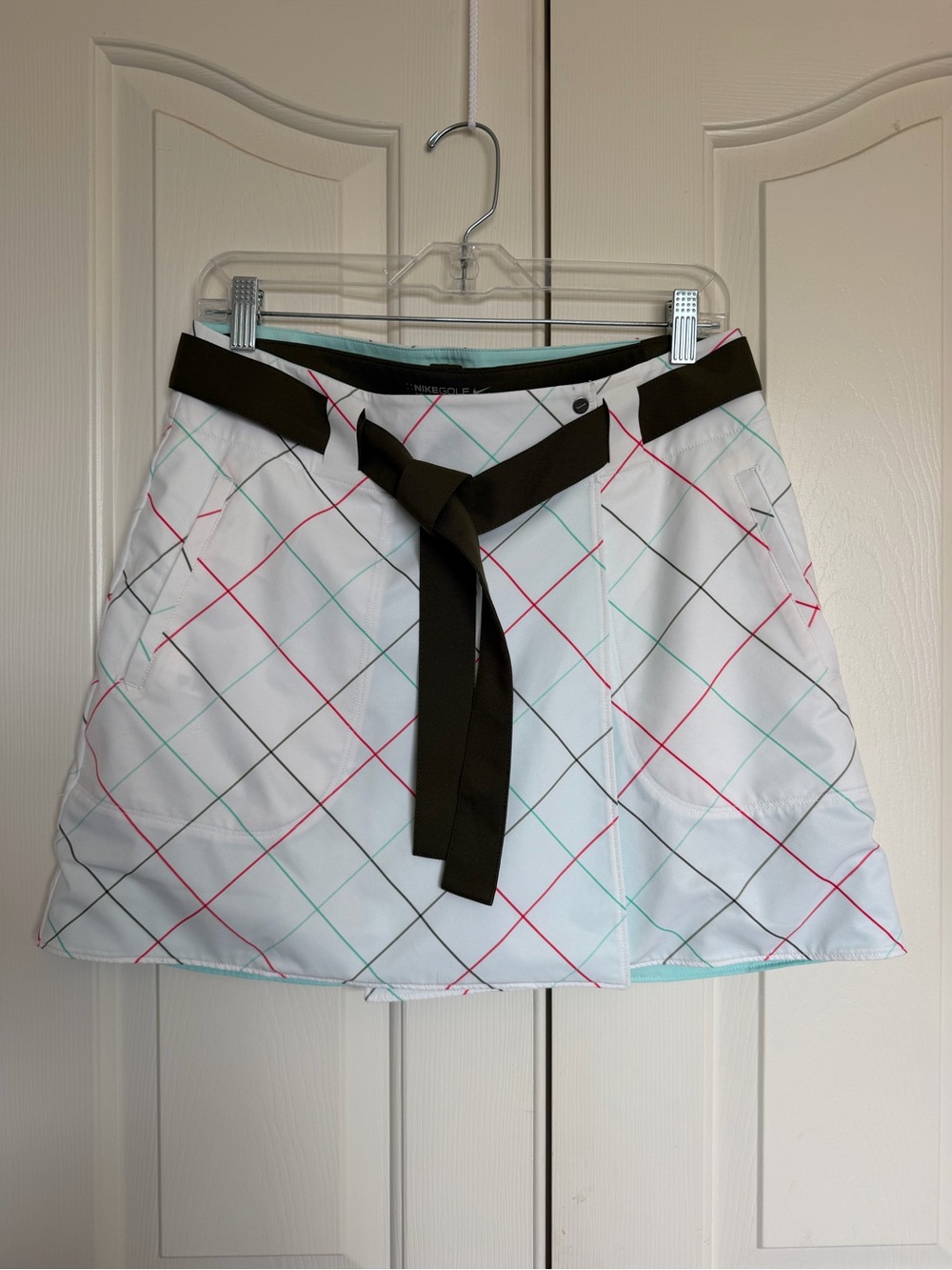 Nike Golf Reversible Wrap Skit with Detachable Shorts.